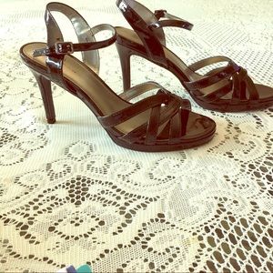 Black patent leather high-heeled sandals